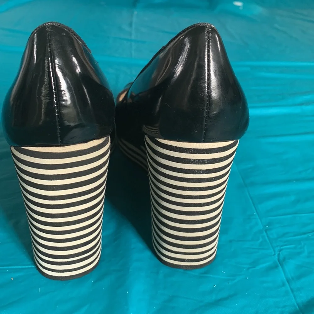 Gently worn Michael Kors Adlai’s Black and Cream Strip Wedge Shoes.